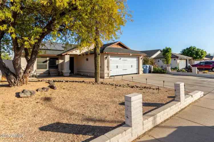 Buy Energy Efficient Home in Phoenix with Solar and Backyard Features