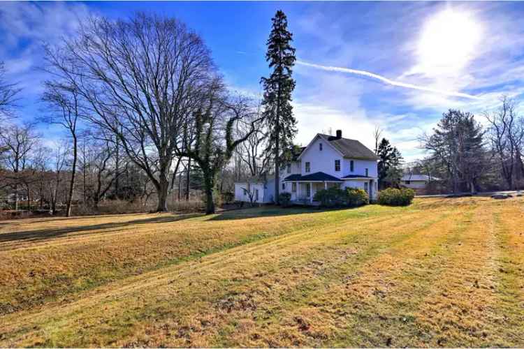 Buy farmhouse in Newton with historical appeal and charming features