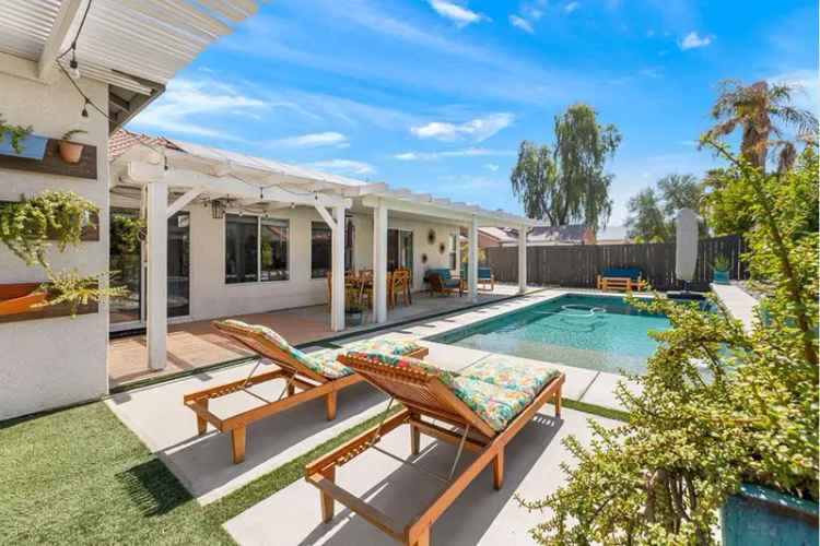 Buy Home in Desirable Neighborhood with Pool and Modern Updates