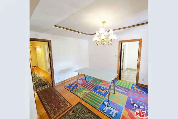 Buy Spanish Style Home in Reynier Village with Spacious Yard and Solar Panels