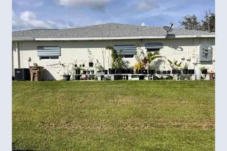 Duplex for sale in NE Cape Coral with income potential and no flood zone