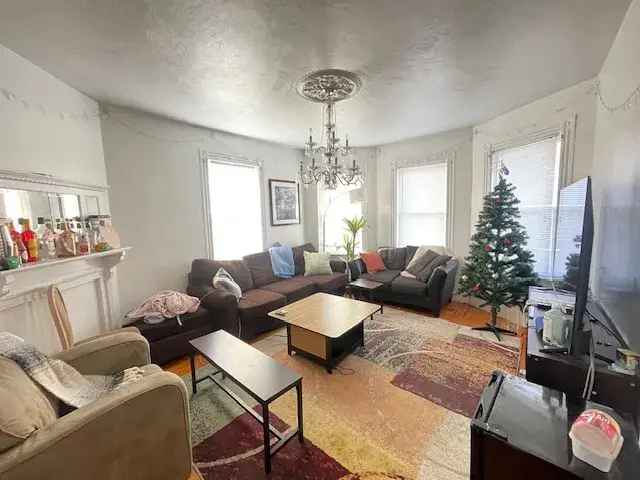 Rent 5 Bedroom Apartment in Mission Hill with Sunroom and Renovated Kitchen