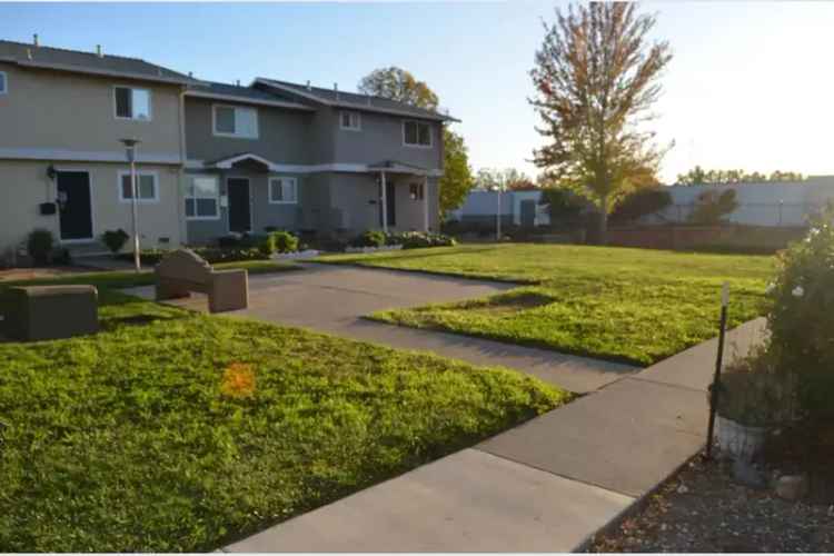 Buy Townhome in Convenient Location with Patio and 2 Car Garage