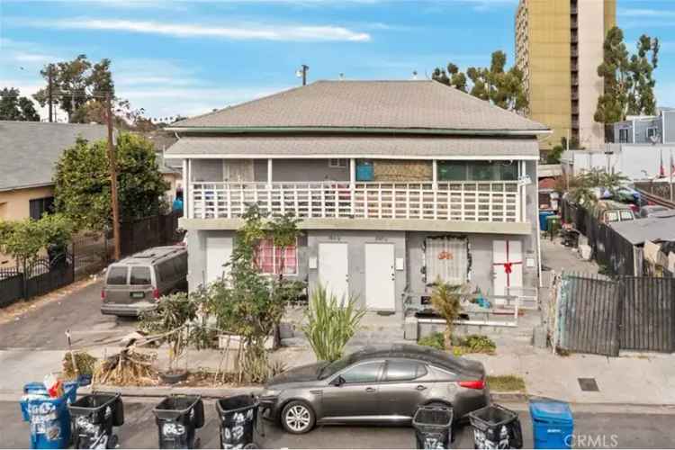 Quadplex for Sale in Los Angeles with Parking and Redevelopment Potential