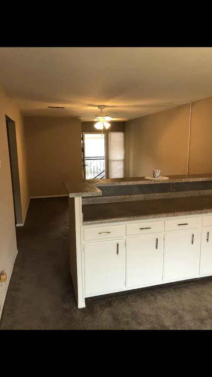 Rent Charming Apartment with Patio Areas and Onsite Laundry