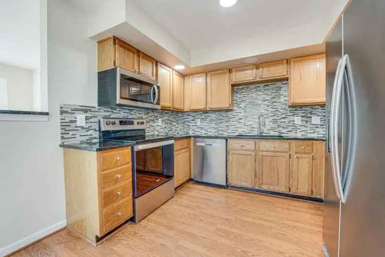 Rent Beautiful 4 Bedroom Townhome with Community Amenities