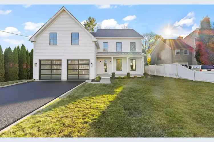 Stylish farmhouse for sale in hip Saugatuck with 7 bedrooms and pool site