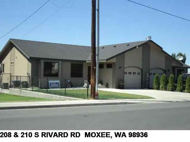 Rent Duplex in Moxee with Yard Storage Garage and Entertainment Features