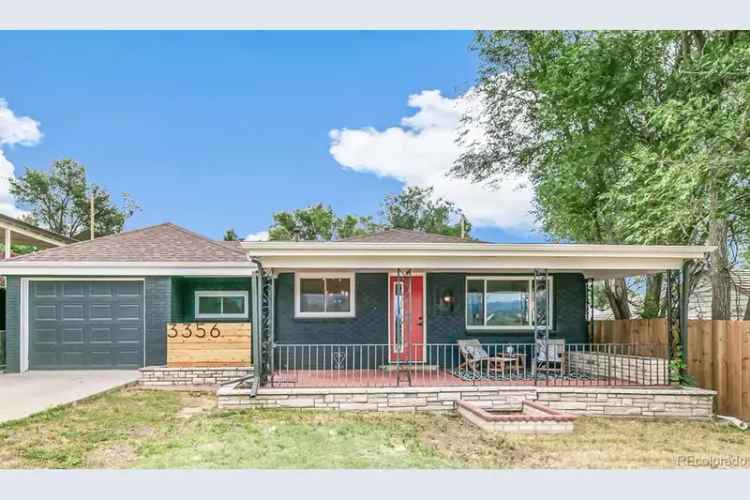 Buy modern house with stunning Rocky Mountain views near Loretto Heights Park