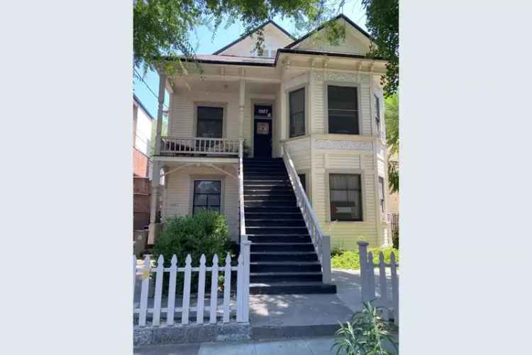 Buy Classic Victorian Fourplex with Old World Charm and Inviting Backyard