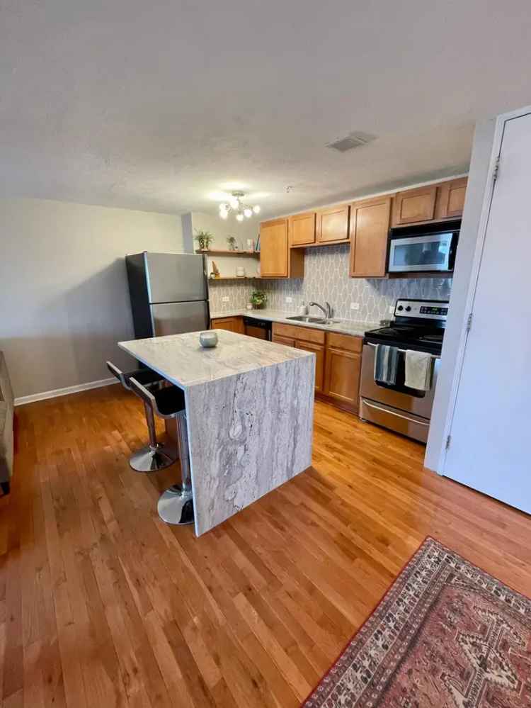 Rent Condo in Midtown Crossing with Fitness Center and Rooftop Patio