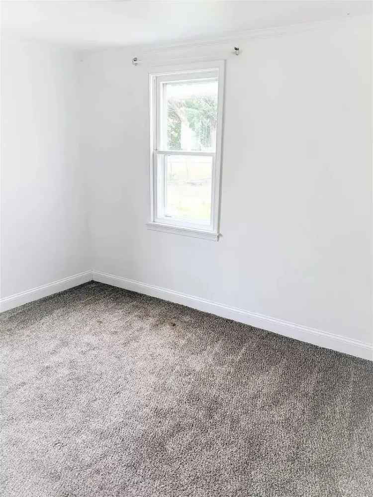 Rent Apartment Unit with Fenced Yard and Modern Kitchen