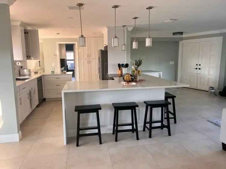 Rent Stunning 4 Bedroom Pool Home with Gulf Access in Cape Coral