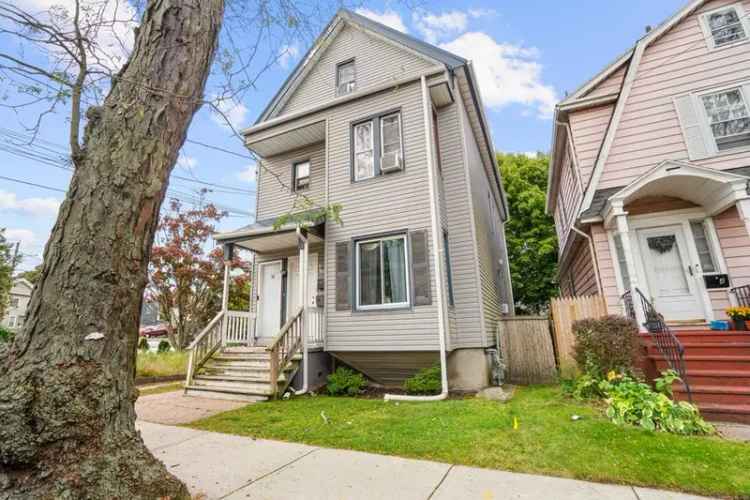 Invest in a Duplex in New Haven with Spacious Units and Backyard