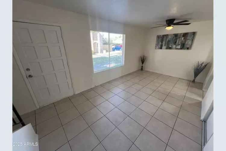 Buy Home in Great Condition with Spacious Living Room and Covered Patio