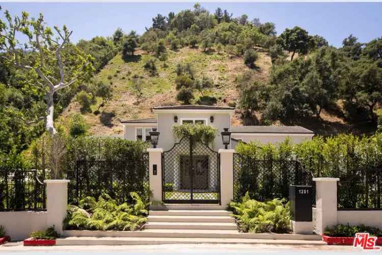 Elegant colonial Mediterranean home for sale in Stone Canyon Road