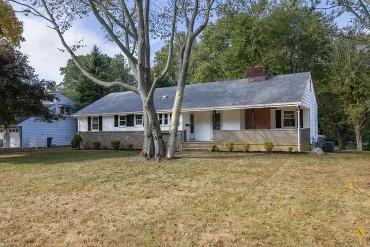 Single Story Home for Sale in Trumbull with Covered Porch and In Law Suite