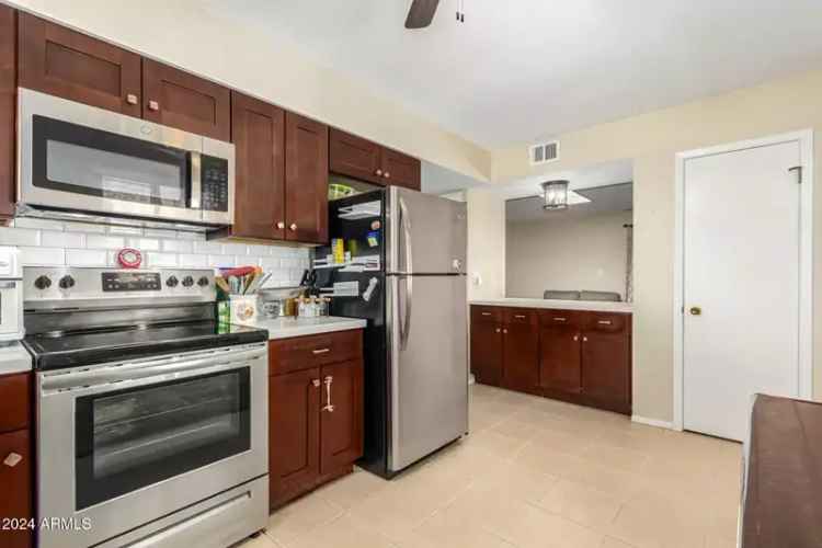 Buy Townhome in Sun City with Updated Kitchen and Solar Panels