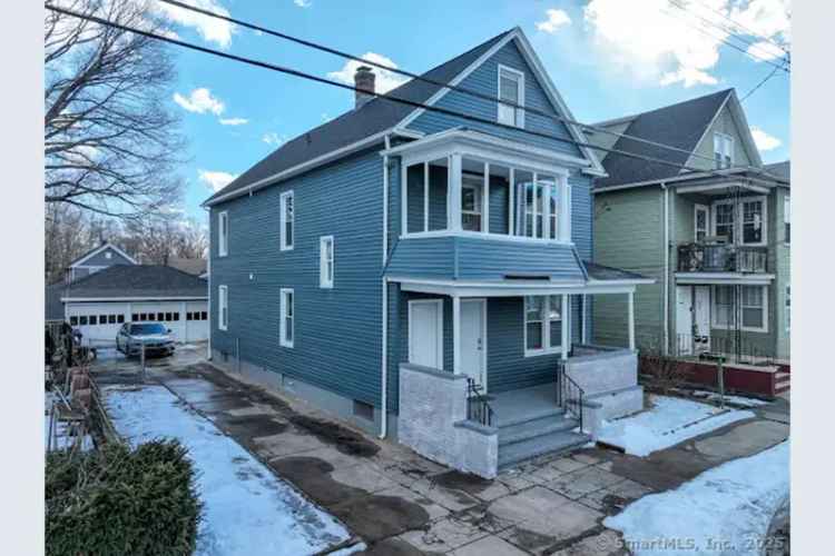 Two Family Home for Sale in West Haven with Modern Updates and Garage