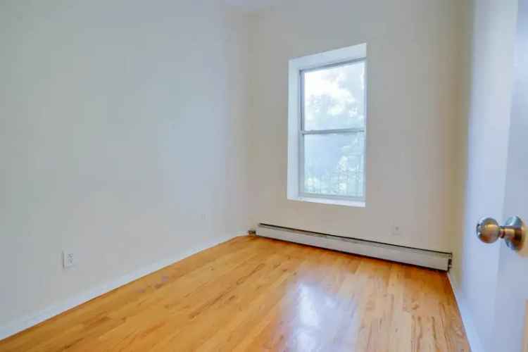 Rent Apartment Unit with Spacious Living Room and Immaculate Kitchen