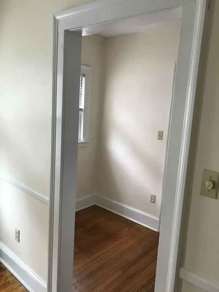 Rent Cozy Apartment Unit in Friendly Neighborhood with Porches and Garage