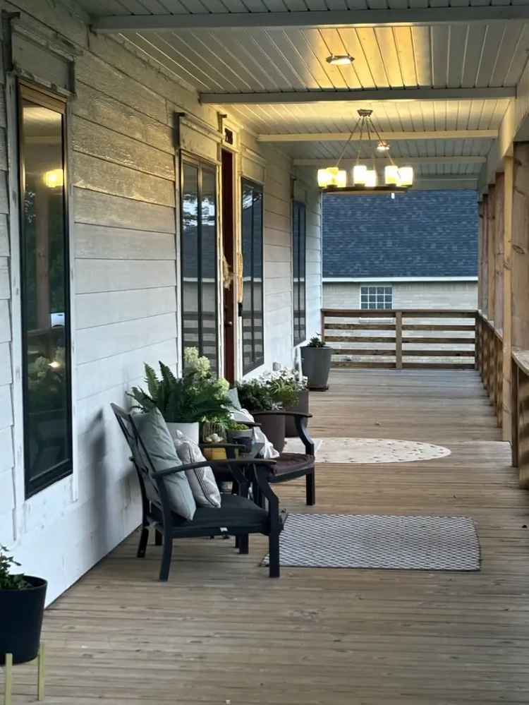 Rent Modern Farmhouse with Wraparound Porch in Country Setting