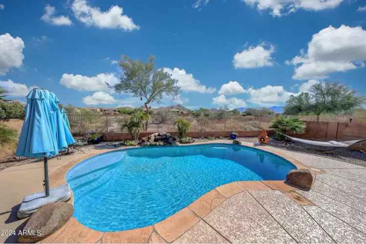 Buy Pool Home in Estrella with Desert Views and Golf Course Access