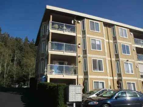 Rent Lovely View Condo in Puget Sound with Covered Deck and Fire Place