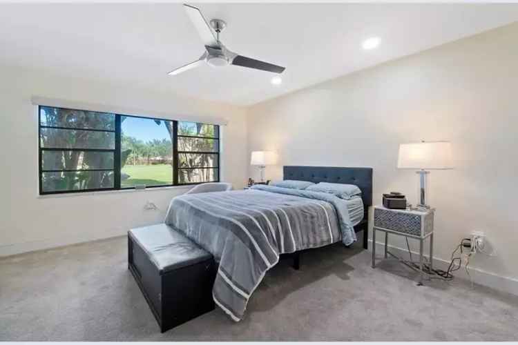 Buy condo with golf views in remodeled first-floor layout