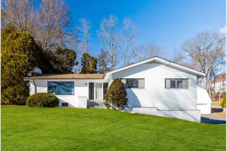 Buy Mid-Century House in Putney with Scenic Views & Unique Features