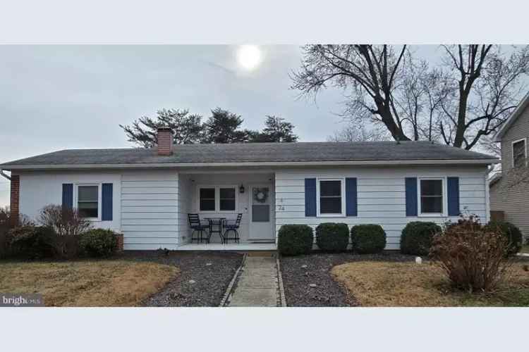 Charming buy home with hardwood flooring and a huge deck