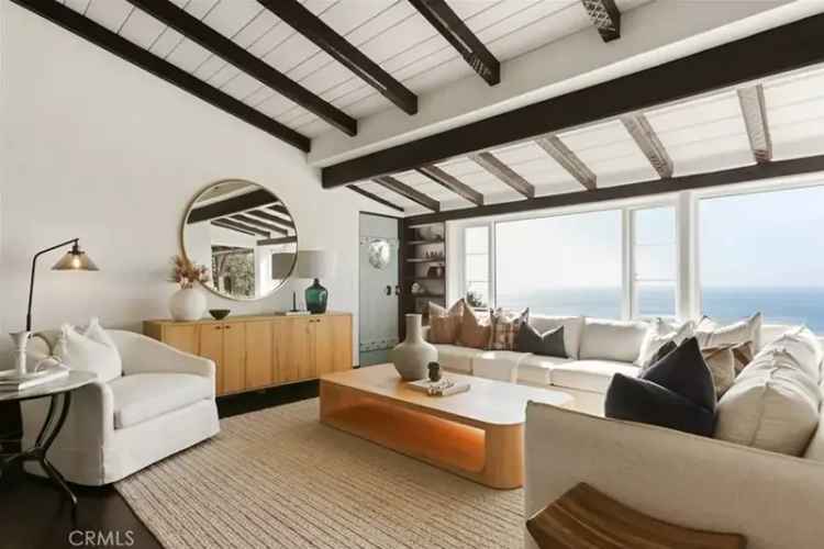 Buy cottage with ocean views in Laguna Beach featuring three bedrooms