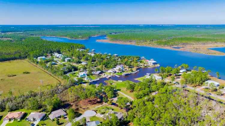 Vacant lot for sale in Orange Beach with water view and community amenities