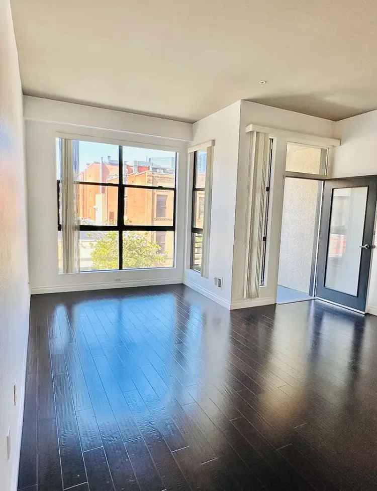 Rent Apartment Unit in Downtown with Modern Features and Balcony Views