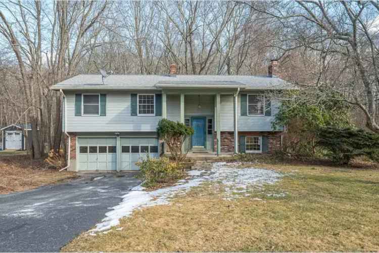 Buy House in Niantic with Cozy Features and Wooded Views