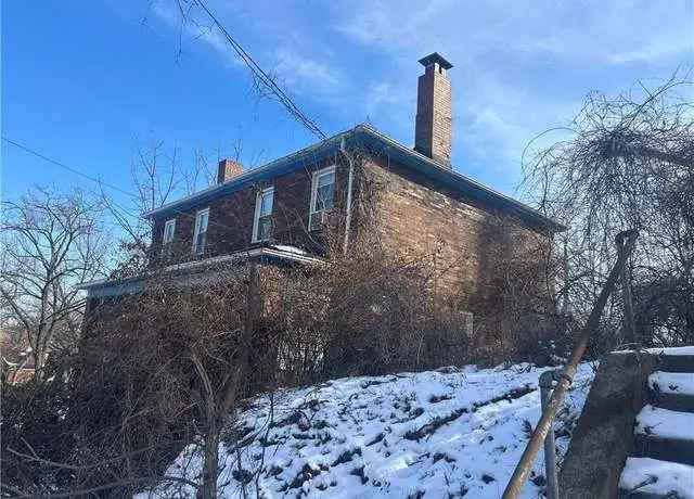 Investment buy row houses in East Liberty with renovation potential