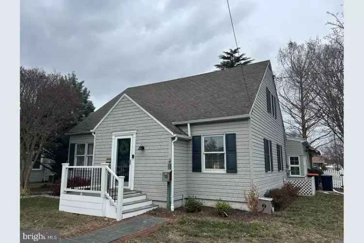 Buy Cape Cod Style Home in Middletown with Updated Features and Backyard Oasis