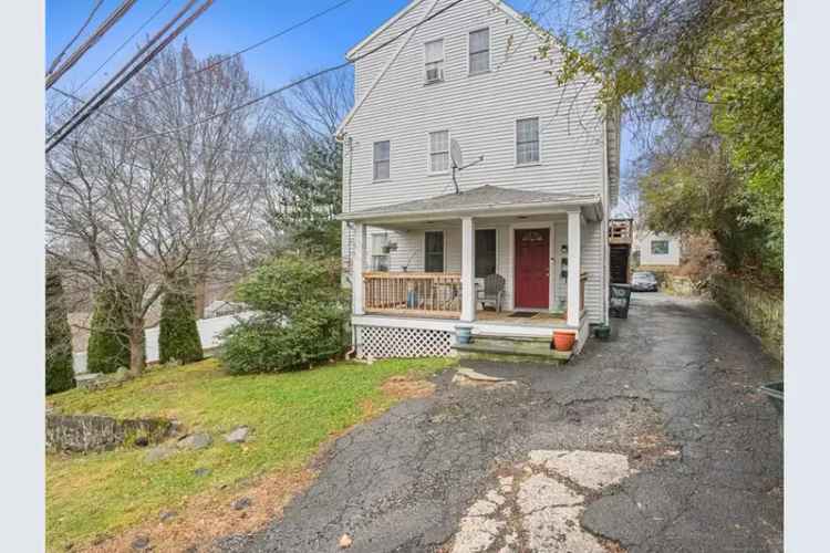 Rent two-family home in Norwalk with versatile living space and potential