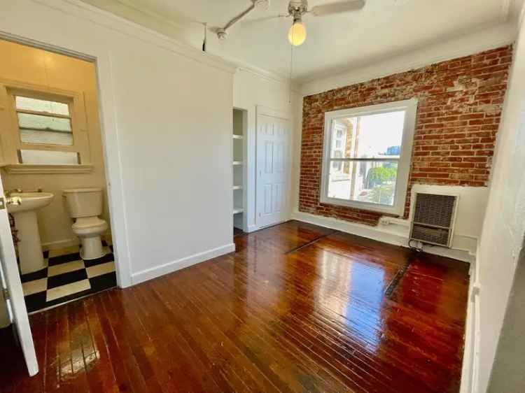 Rent Studio Apartment in 1920s Style Building with Utilities Included