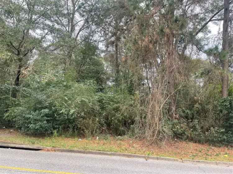 Vacant lot for sale in commercial area south of Airport Blvd