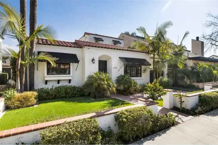 Spanish style home for sale in Belmont Heights with modern updates