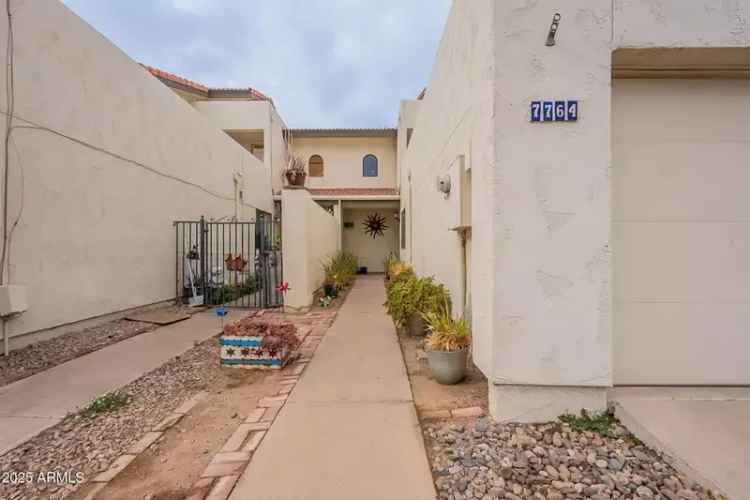 Buy townhouse in Phoenix with 3 beds, 2 baths, and private rooftop balcony