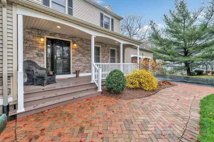 Buy Colonial Home in North Stratford with Updates and Private Patio