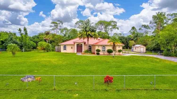 Ranch Style Home for Sale in Loxahatchee with Pool and Horse Stable