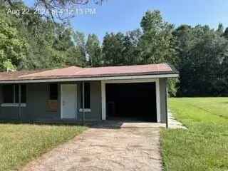 Buy House Close to Interstate 1-10 with Renovation Potential in Mobile