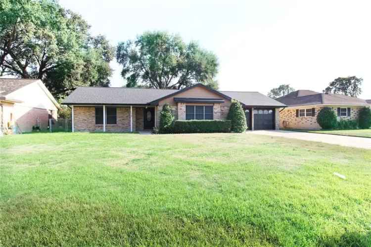 Buy one story home in Alvin with spacious backyard and updated interiors