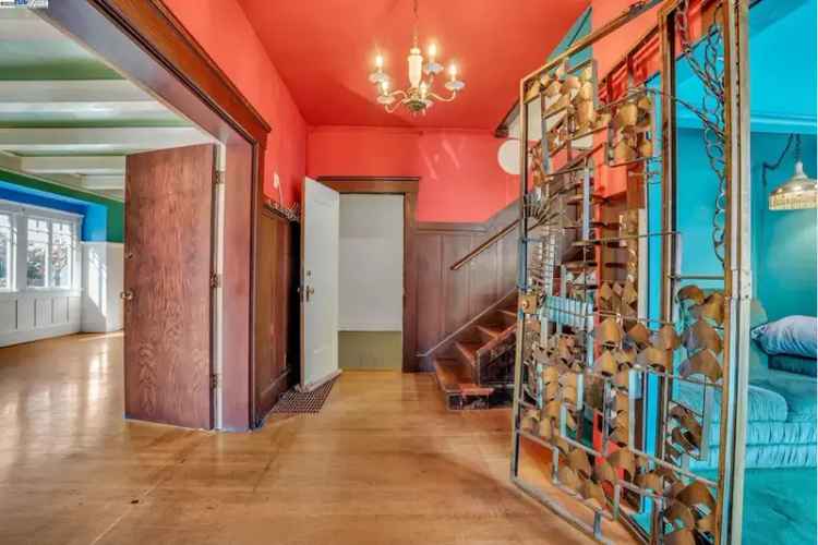 Fixer Upper Triplex for Sale in Adams Point with Great Potential