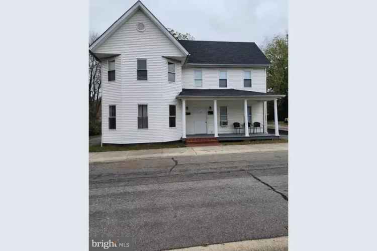 Income Producing Buy Duplex in Downtown Harrington with Private Yards