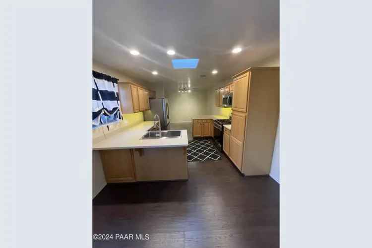 Rent Updated Townhome with Golf Course Access in Antelope Hills