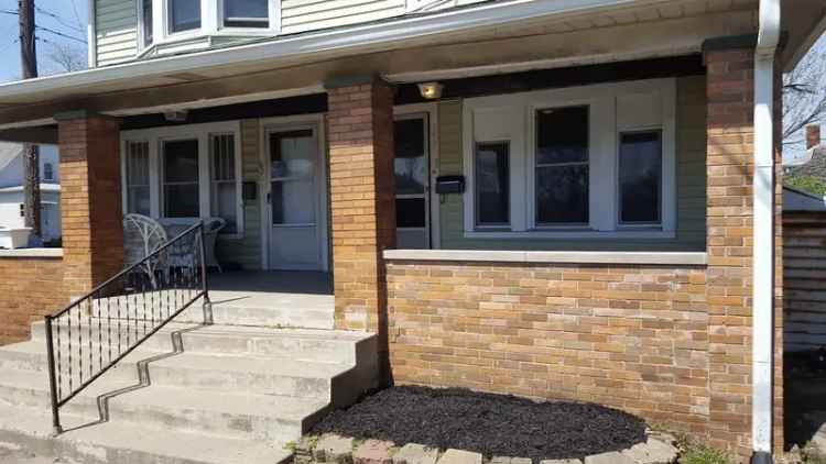 Rent Roomy Townhouse with Modern Upgrades and Fenced Yard Near Garfield Park